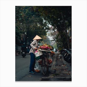 A Lady Selling Fruit In Hanoi Canvas Print