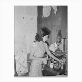 Mexican Girl Straightening Corner Of Her Kitchen, San Antonio, Texas By Russell Lee Canvas Print