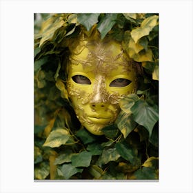 Mask Dressed In Green Leaves And Yellow Leaves. Nature concept Canvas Print