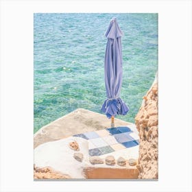 Milos, Greece I Private beach paradise on french riviera in clear blue waters of Mediterranean sea under the summer sun with parasol for minimalist composition of fine art photography pastel aesthetic Canvas Print