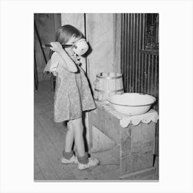 Josie, Daughter Of Faro Caudill, Drinking Water In Front Of Washstand, Pie Town, New Mexico By Russell Lee Canvas Print