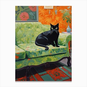 Black Cat Sitting In An Green Armchair Nannycore Canvas Print