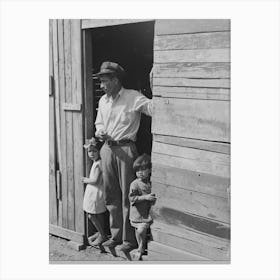Untitled Photo, Possibly Related To Mexican Father And Children In Doorway Of Their Home Made Of Scrap Lumber Canvas Print
