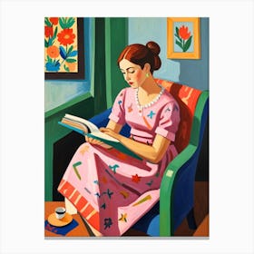 Reading A Book Canvas Print