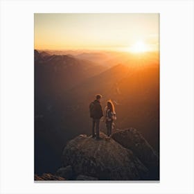 Couple Standing On Top Of Mountain At Sunset Canvas Print