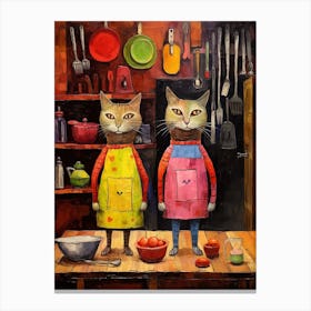 Two Cats With Aprons In A Kitchen Canvas Print