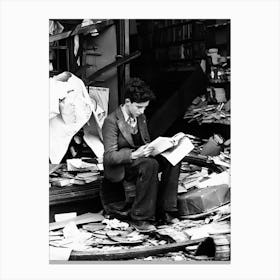 Young Man Reading A Book After Bomb Raid, Vintage Black and White Old Photo Canvas Print