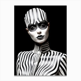 Artistic portrait of young extravagant bald woman with a black and white costume Canvas Print