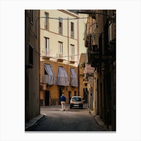 A Man Wandering The Streets Of Sicily Canvas Print