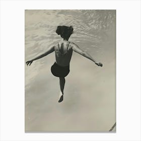 Woman Jumping Into The Water Canvas Print