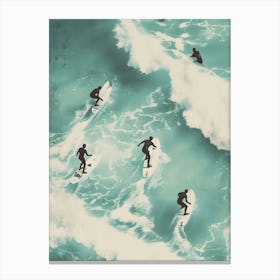 Surfers In The Ocean Canvas Print