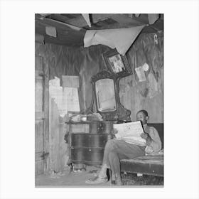 Sharecropper Reading Newspaper In Corner Of Living Room, Note The Bureau And Ceiling, Near Southeast Missouri Canvas Print