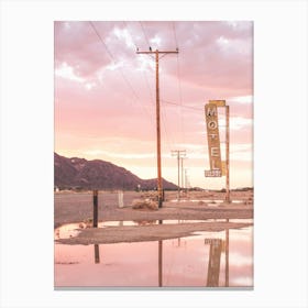 Route 66, USA I Sunset in front of a vintage retro motel neon sign in a California desert landscape to pastel pink sky sun aesthetic and a mirrored reflection in water photography in front of the Bagdad Cafe Canvas Print