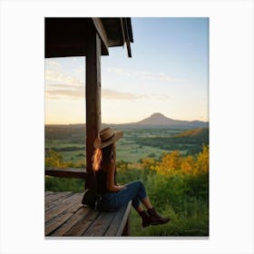 Woman Exuding A Sense Of Freedom While Sitting On A Wooden Porch Overlooking A Vast Hill And Sky Th Canvas Print