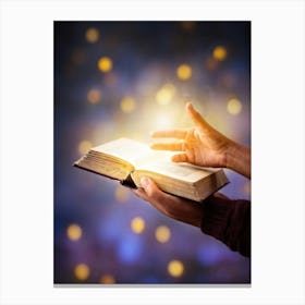 A Hand Gently Holding Open A Holy Bible To Highlight A Passage Surrounded By A Soft Glow That Sugge Canvas Print