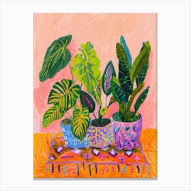 Three Plants On A Table Canvas Print