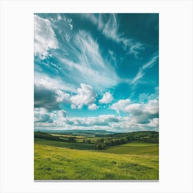 Cloudy Sky Over A Green Field Canvas Print