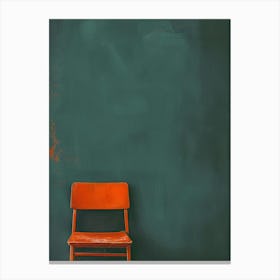 Orange Chair Against A Green Wall Canvas Print