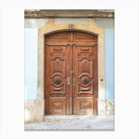 The wooden door nr. 19 in Alfama, Lisbon, Portugal - summer travel photography by Christa Stroo Photography Canvas Print