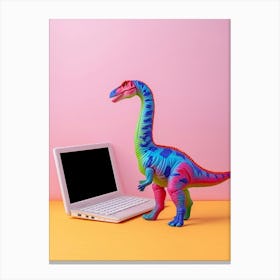 Colourful Toy Dinosaur On A Laptop Canvas Print