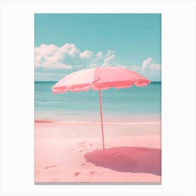 Pink Umbrella On The Beach Canvas Print