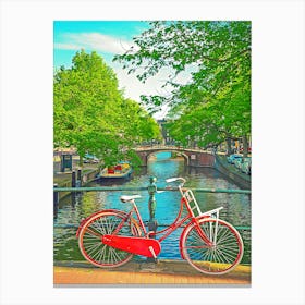 Red Bicycle On A Bridge In Amsterdam, The Netherlands Canvas Print