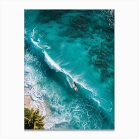 Capture An Aerial Perspective Of A Daring Surfer Confidently Riding The Islands Largest Wave On A S (5) Canvas Print