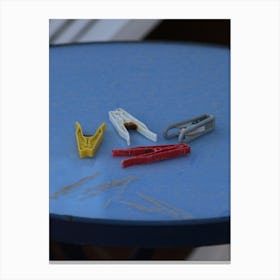 Clothespins On A Table Canvas Print