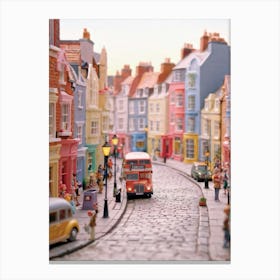 Uk Street Curving Gently Whimsical Claymation Style Pastel Colored Houses Leaning Over Cobblestone Canvas Print