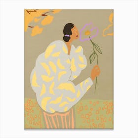 Woman Blowing A Flower Canvas Print