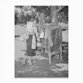Mrs, Faro Caudill Placing Milk Into Homemade Cooling Box, Damp Cloths Are Wrapped Around Buckets And Jars Of Canvas Print