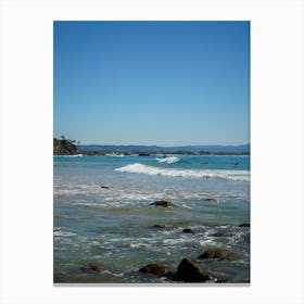 Beach At Daytime With Waves, Rocks And Surfers On Iconic Australian Beach. Clear Blue Skies Canvas Print