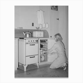 Wife Of Member Of The Arizona Part Time Farms, Chandler Unit, Maricopa County, Arizona, At Her Kitchen Stove By Russe Canvas Print