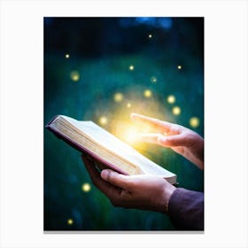 A Hand Gently Holding Open A Holy Bible To Highlight A Passage Surrounded By A Soft Glow That Sugge (1) 2 Canvas Print