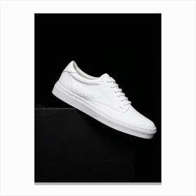 White Shoe Embodies Elegance Rests On Contrasting Bold Black Canvas Accentuates Minimalistic Desi Canvas Print