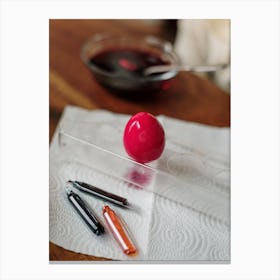 Red Egg On A Table Canvas Print