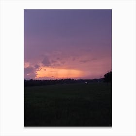 Sunset Over A Field Canvas Print