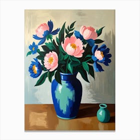 Peonies In A Blue Vase Canvas Print