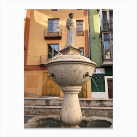 Fountain in the town Canvas Print