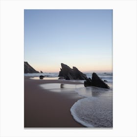 Rocks at Praia da Adraga at sunrise - pink sky on a beach in Portugal summer nature and travel photography by Christa Stroo. Canvas Print