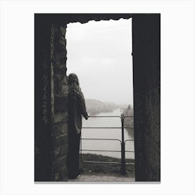 Woman Looking Out A Window in Prague Canvas Print