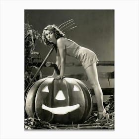 Pin Up Girl Posing On A Jack O' Lantern Canvas Print