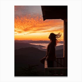 Woman Basking In Sunsets Glow On A Mountain Porch Silhouette Against A Sky Painted With Hues Of Or 2 1 Canvas Print