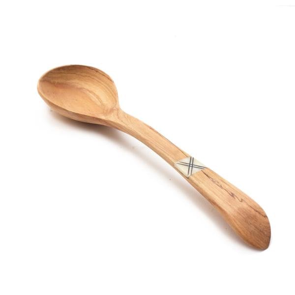 Big Wooden Serving Spoon With Carved Bone Motif by Artisans & Adventurers