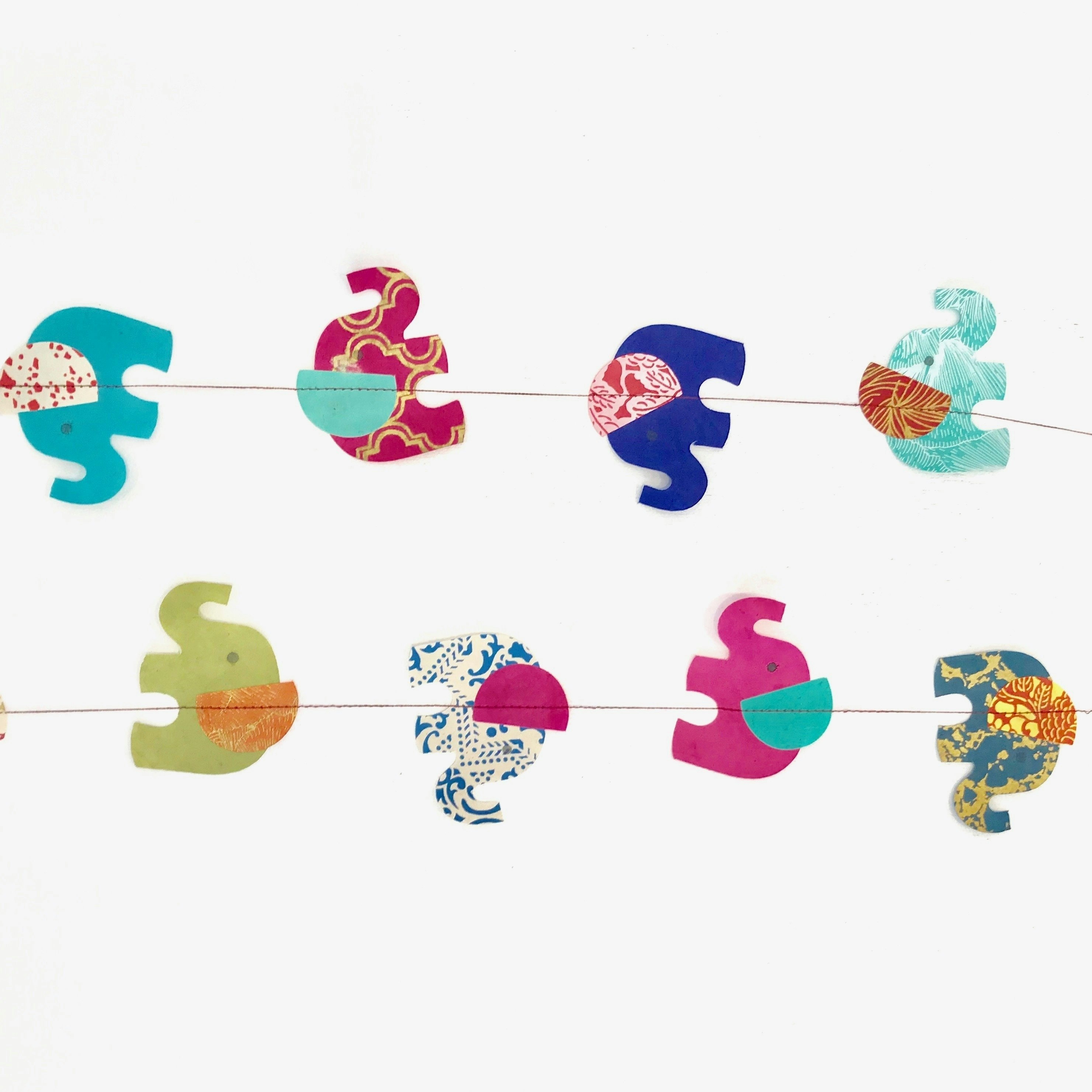 Elephant Pompom and Paper Garland Decor by SCHNUCKI IMAGES
