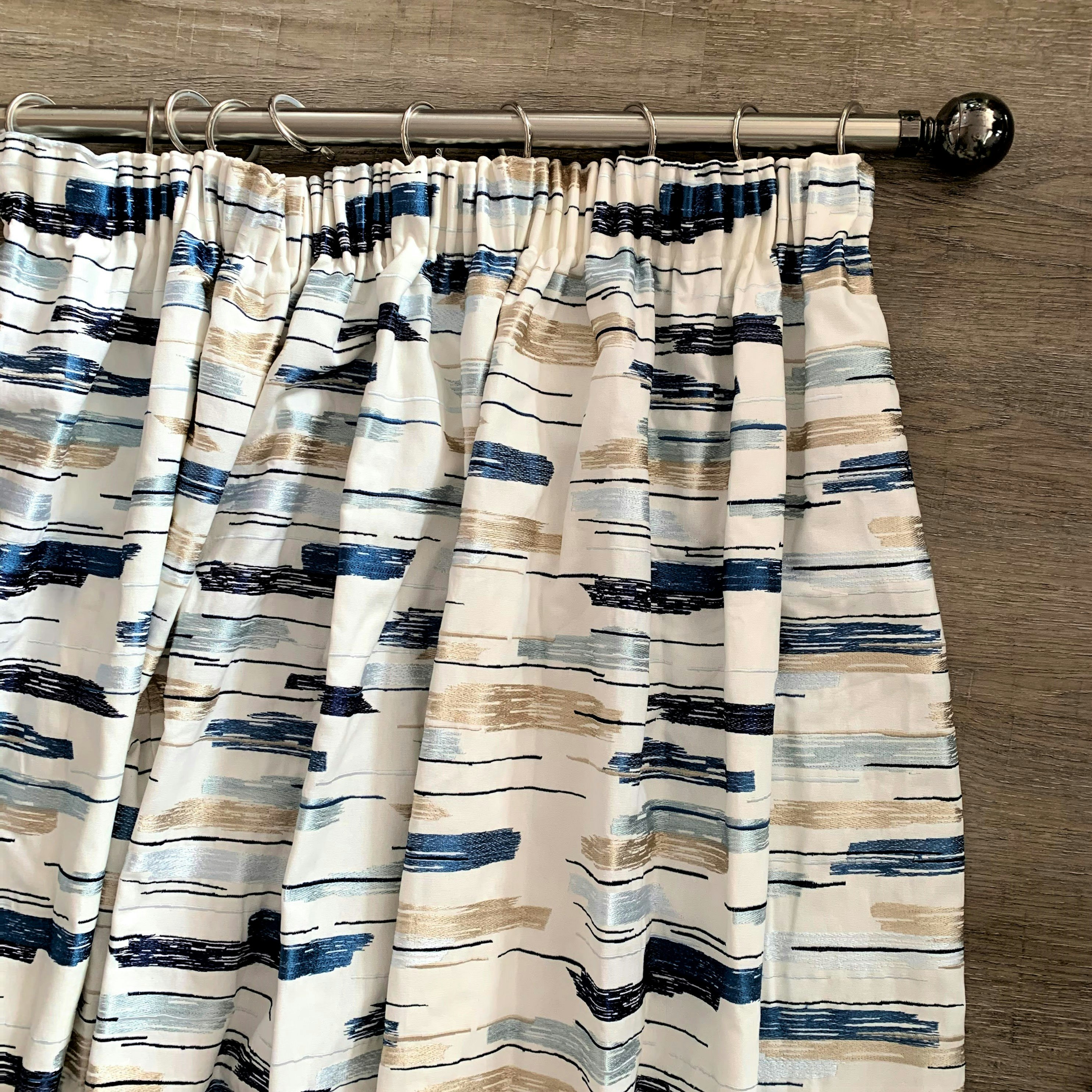 White and Blue Pattered Curtains by
